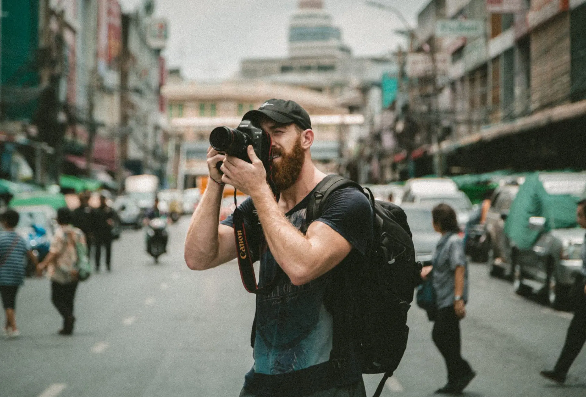 A photographer shooting in a city