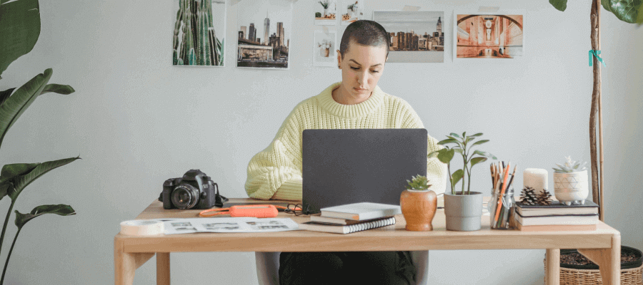 A photographer working at a desk