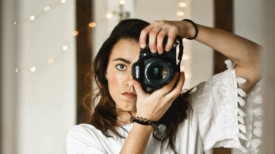 A photographer looking upset