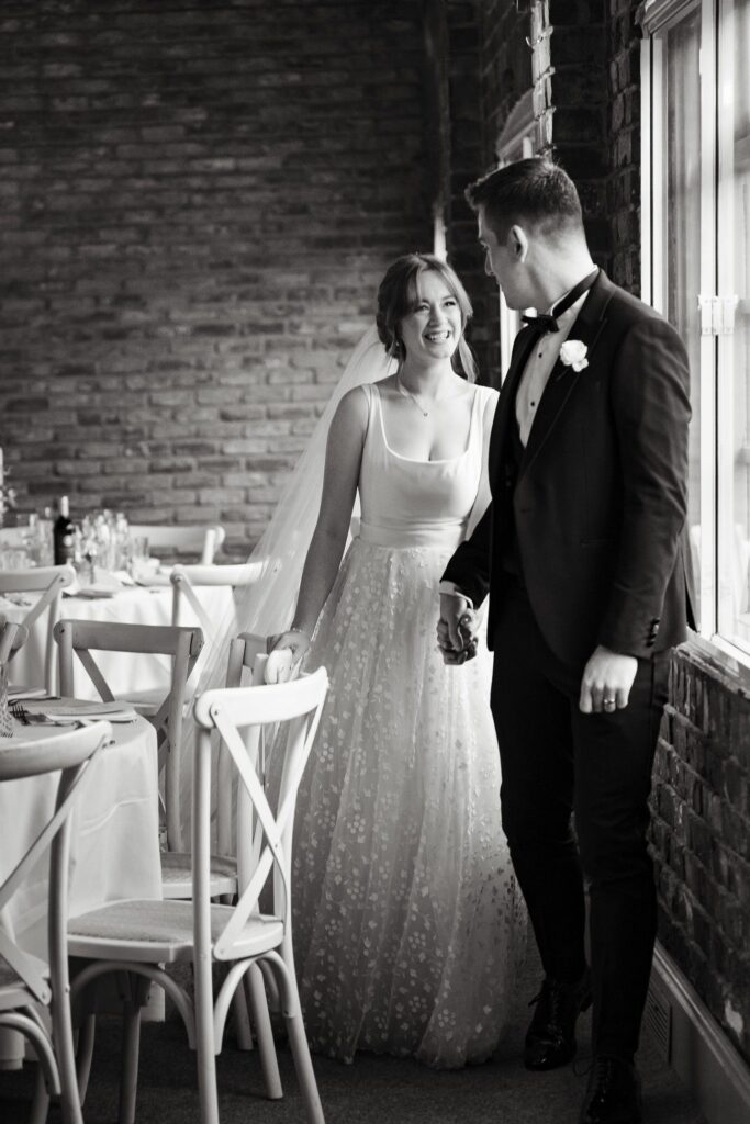 7 Top Mirrorless Cameras for Wedding Photography in 2025 black and white wedding photo