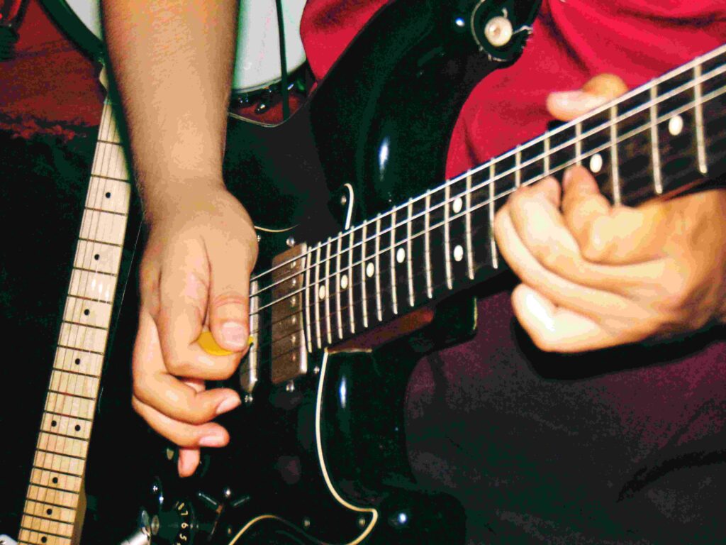 concert photography close up guitar