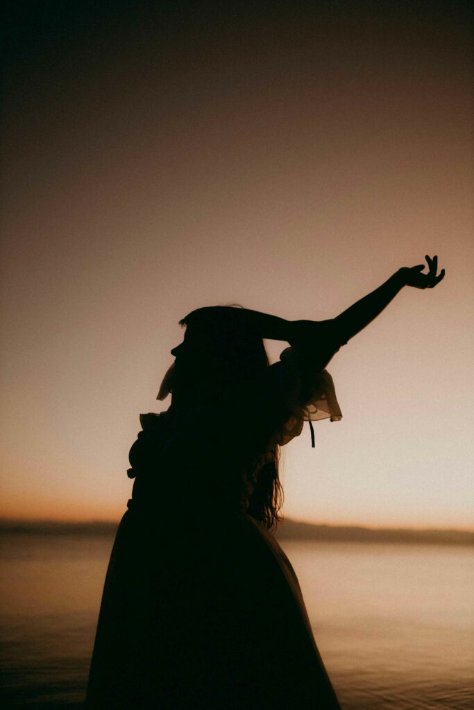 Backlit shot of a woman during the magic hour in natural light