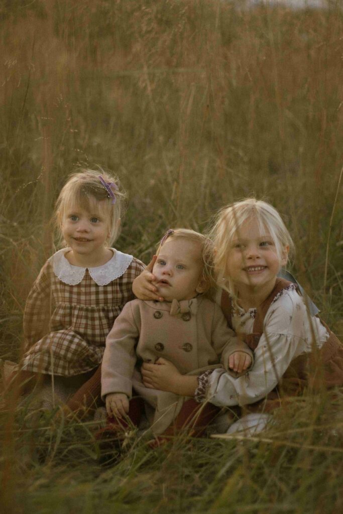 Sit side by side and hold each other like best friends