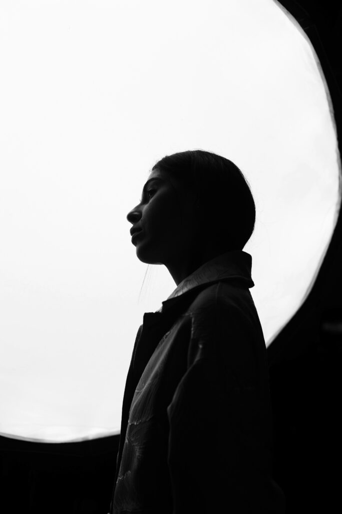 High contrast black and white silhouette portrait